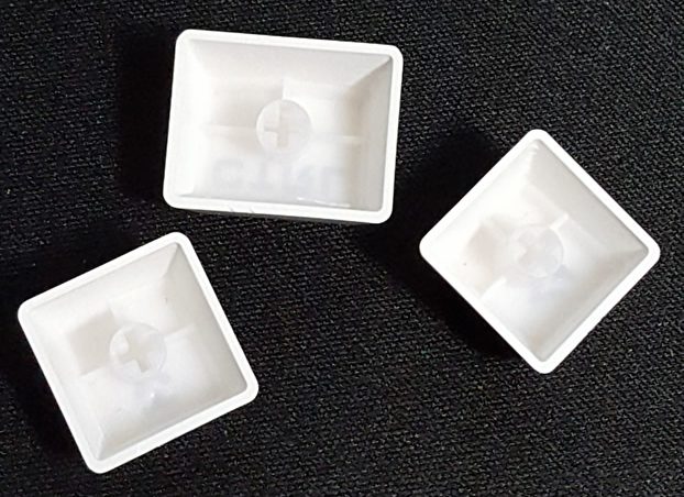 Doubleshot ABS keycaps with clear legends.