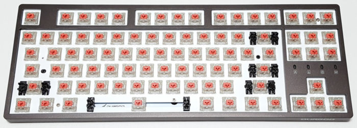 Keycaps removed to expose dampened Cherry MX Silent Red RGB switches