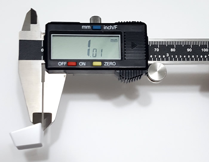Measuring keycap thickness with a caliper