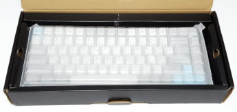 Opening box to reveal internal packaging