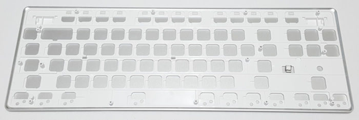 Plastic liner contains flip-out feet and screw bosses