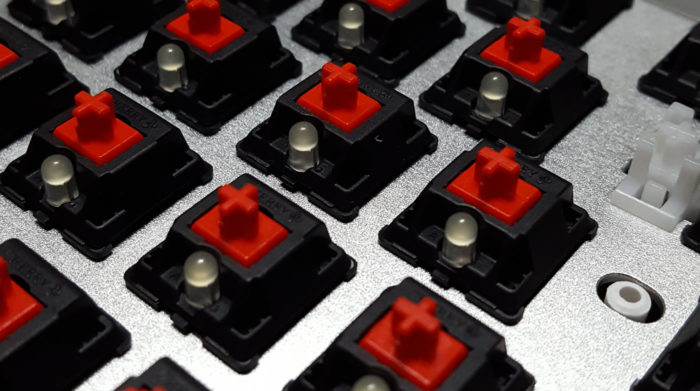 Close-up view showing switch stem and through-hole LEDs